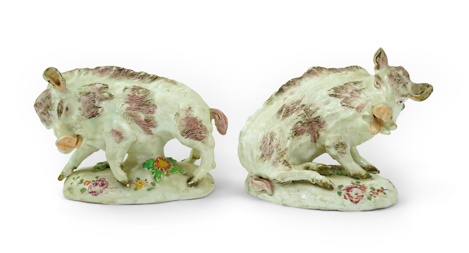 A pair of early Derby porcelain models of wild boars, c.1752-55